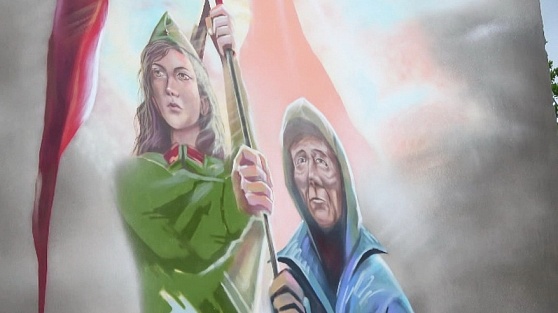 Сургутский художник нарисовал бабу Аню в Донецке